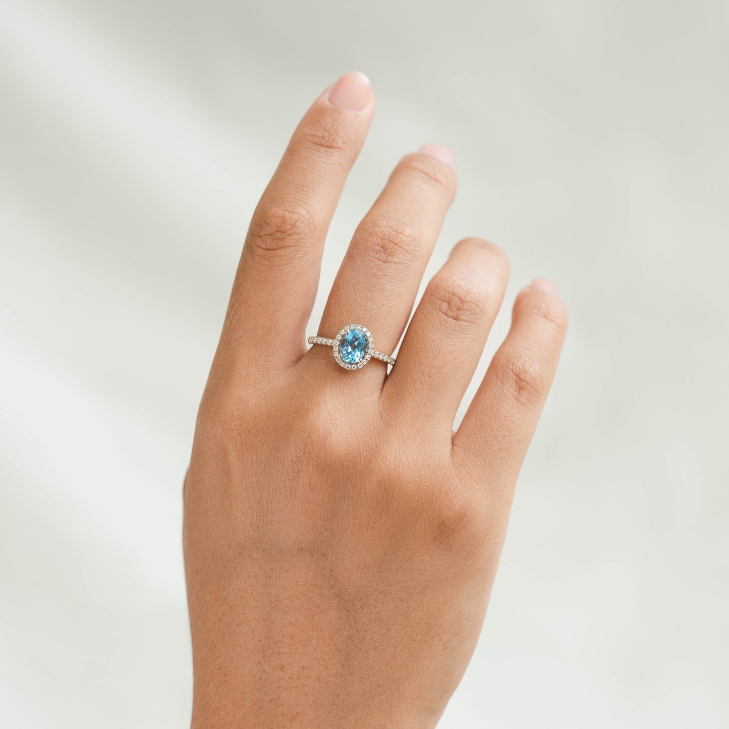 Oval Swiss Blue Topaz Halo Ring 14k Gold - Suna