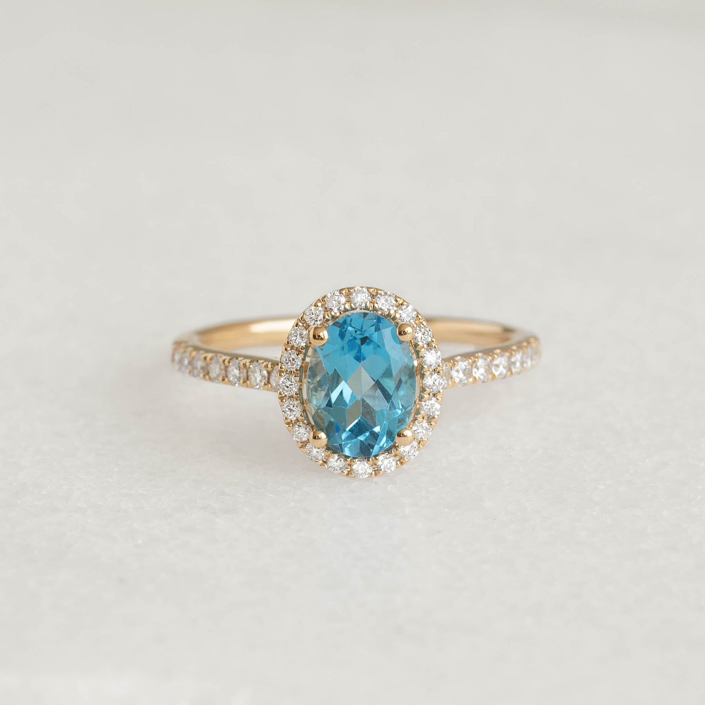 Oval Swiss Blue Topaz Halo Ring 14k Gold - Suna