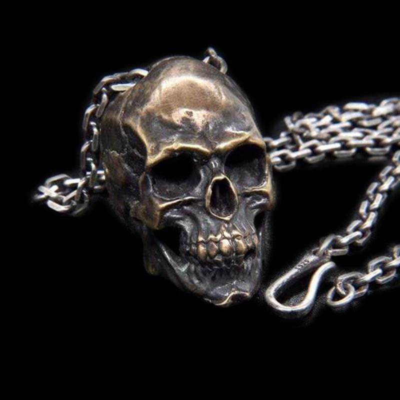 OVERPOWERING SKULL BRASS PENDANT
