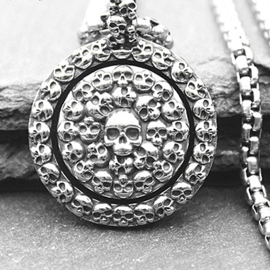 TURNABLE SKULL DISC PENDANT